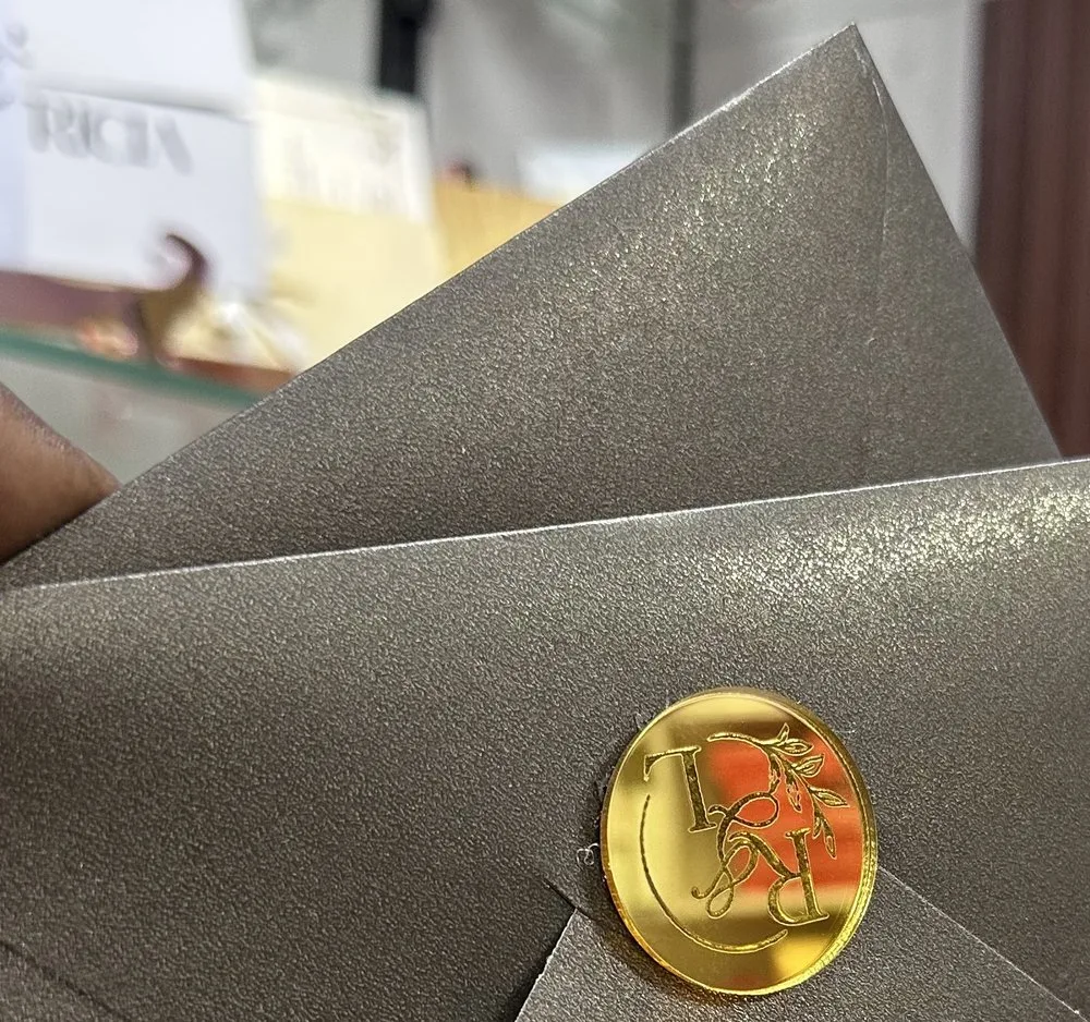 Matching metallic invitation presentation
